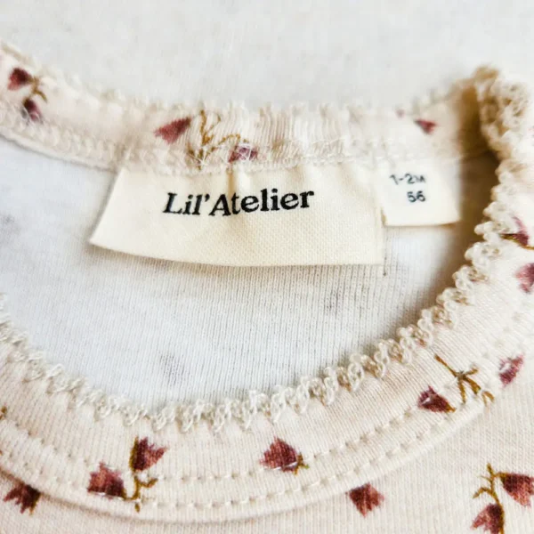 خرید بادی دخترانه آستین بلند طرح گل شیپپوری برند Lil Atelier