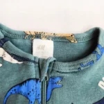 خرید سرهمی دو زیپ طرح دایناسور رنگ سبز برند h&m