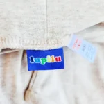 خرید شلوار ضدکولیک ساده کرم برند lupilu