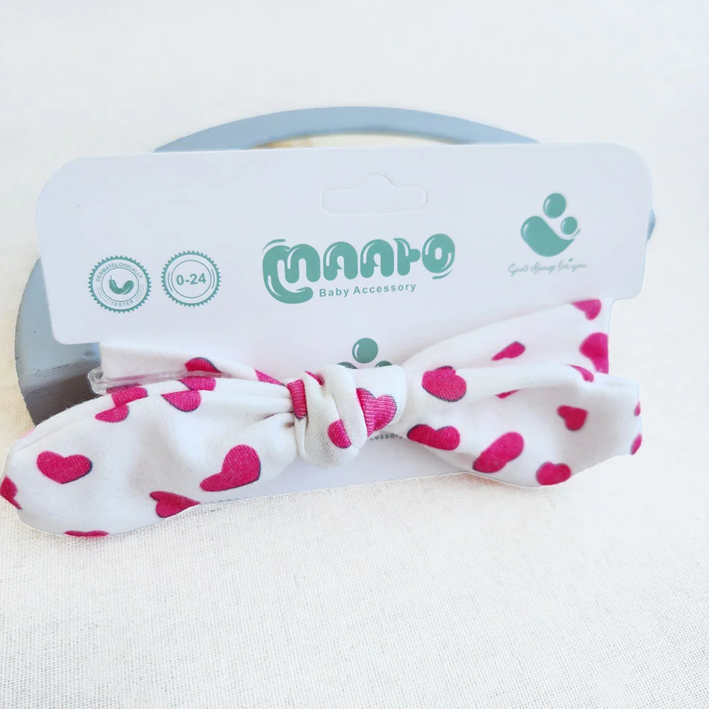 هدبند دخترانه طرح قلب های صورتی