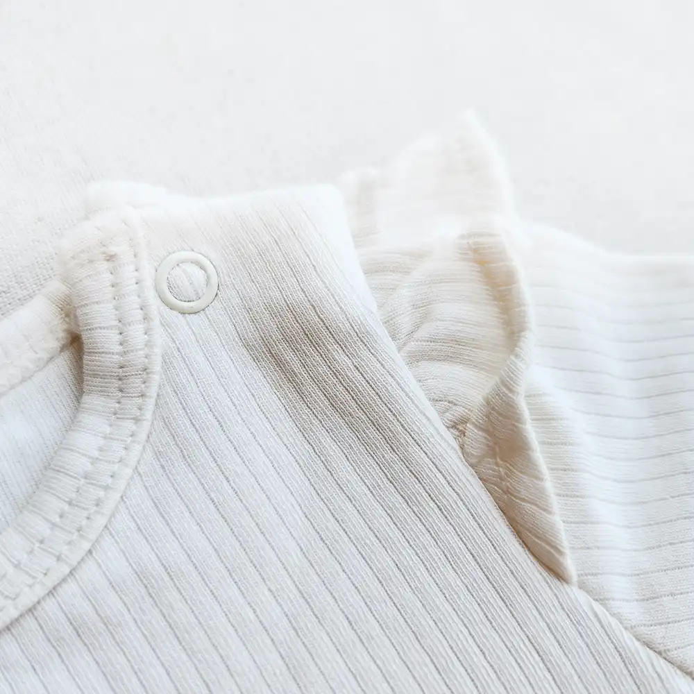 بادی آستین بلند کبریتی وارداتی آستین چین دار رنگ سفید برند C&A