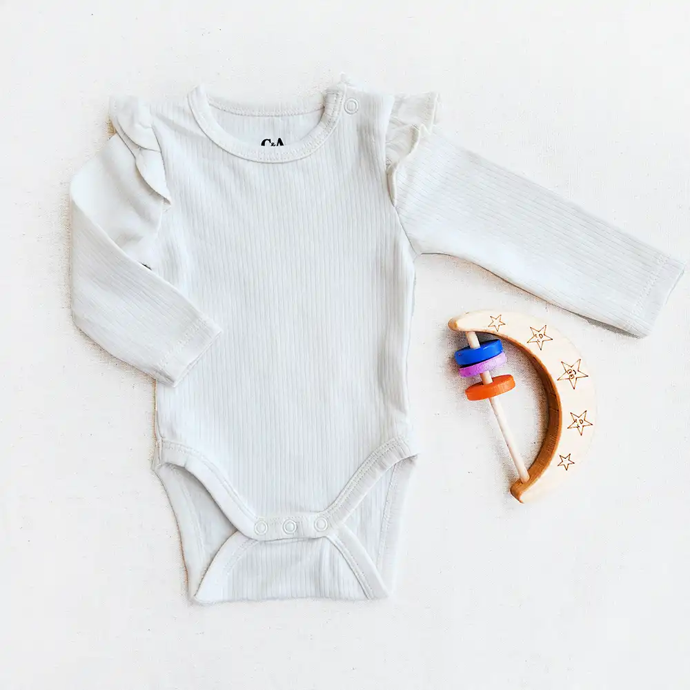 بادی آستین بلند کبریتی وارداتی ساده مدل آستین چین دار رنگ سفید برند C&A