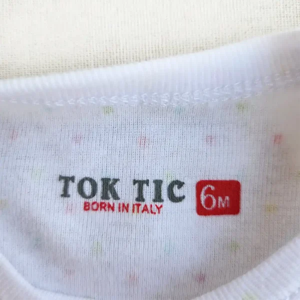 بادی آستین کوتاه وارداتی طرح خال خالی رنگ سفید برند Tok Tic