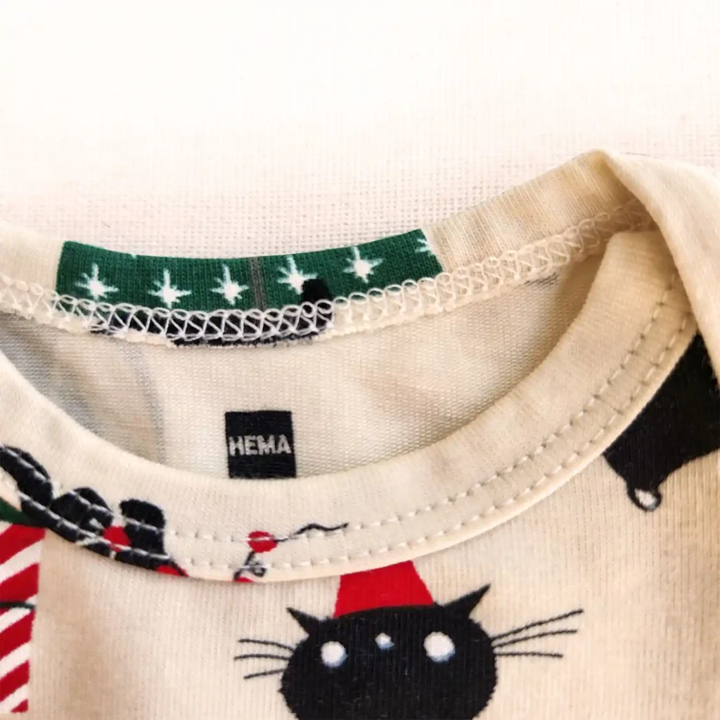 بادی آستین بلند طرح خریدسگ و گربه های کریسمسی برند HEMA