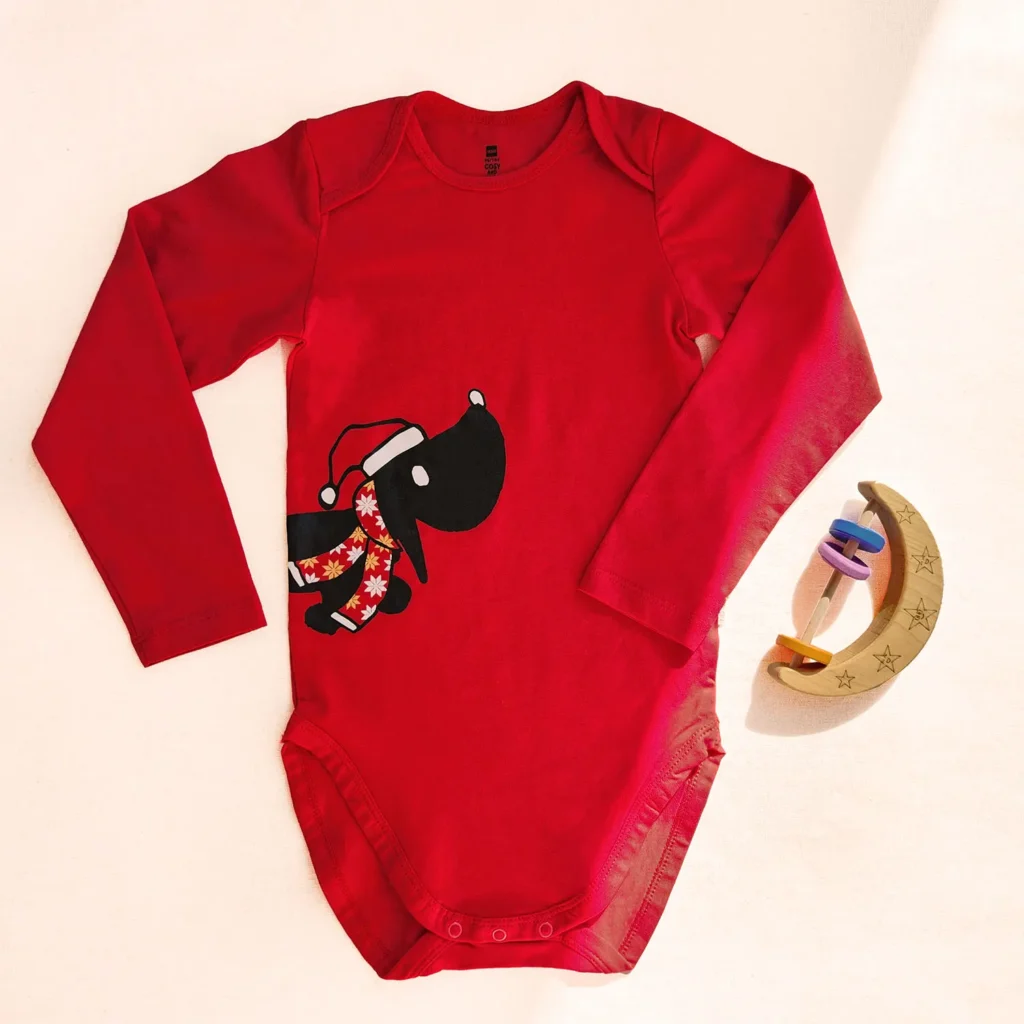 بادی آستین بلند طرح سگ کریسمسی رنگ قرمز برند HEMA