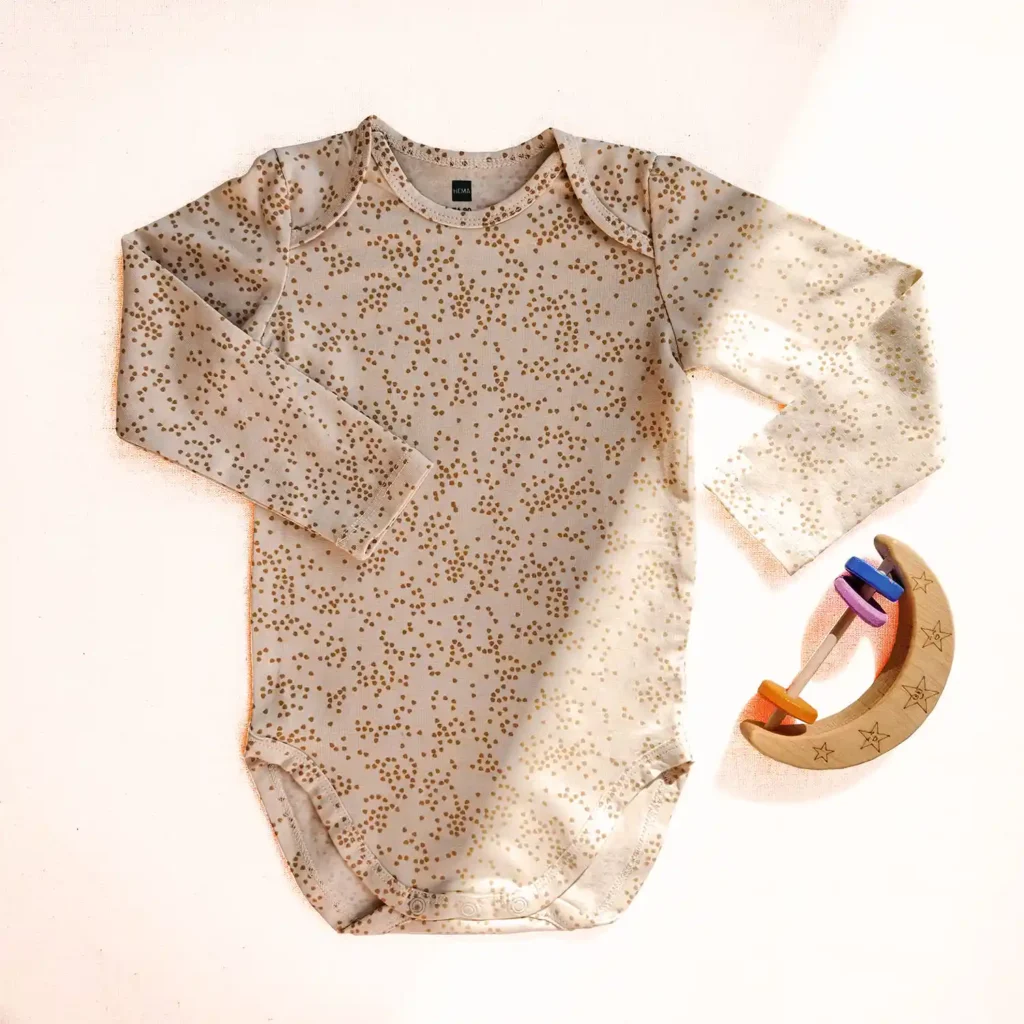 بادی آستین بلند طرح قلب قلبی رنگ شیری برند HEMA