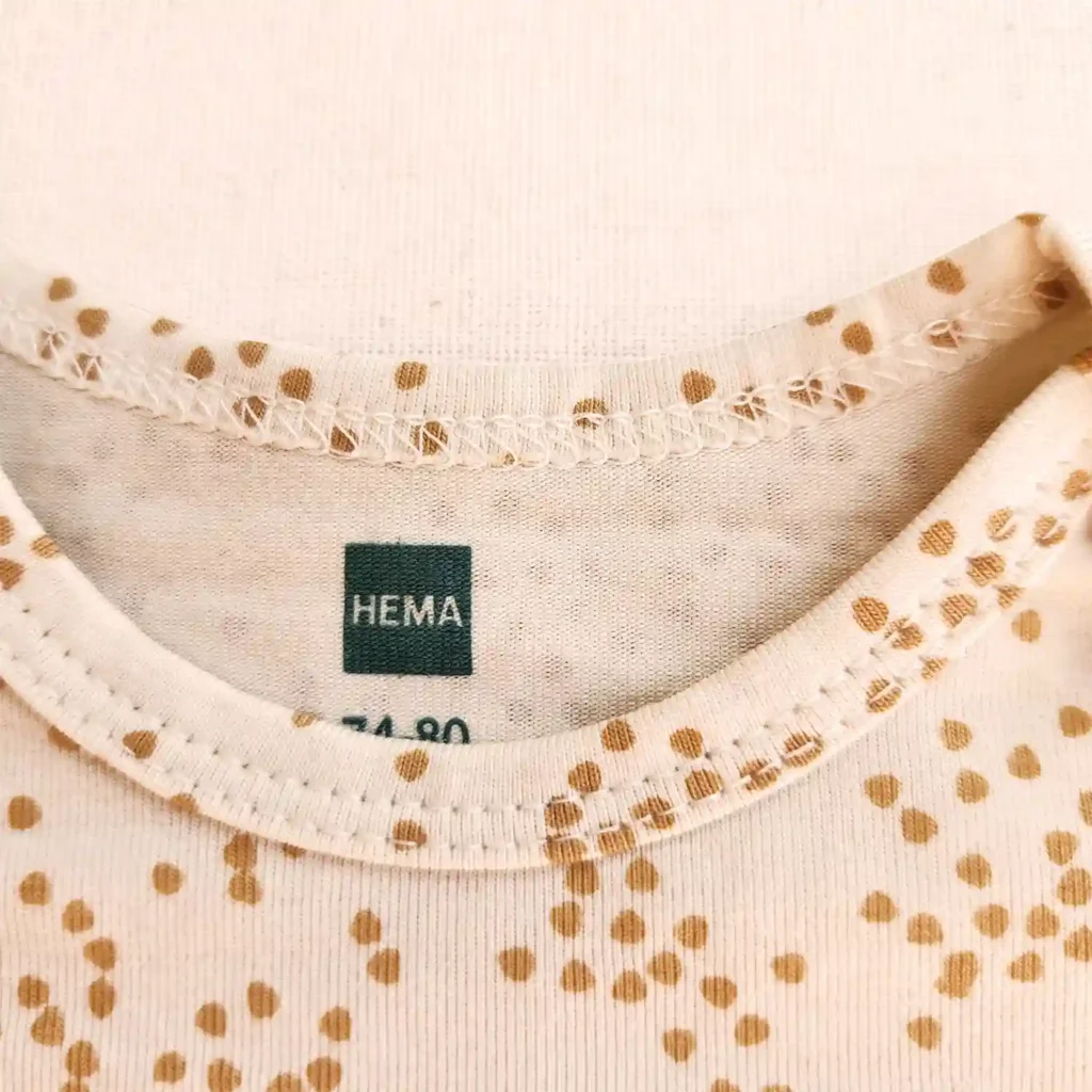 بادی آستین بلند طرح قلب قلبی قیمترنگ شیری برند HEMA