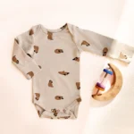 بادی آستین بلند طرح هاپوهای بامزه رنگ کرم برند HEMA