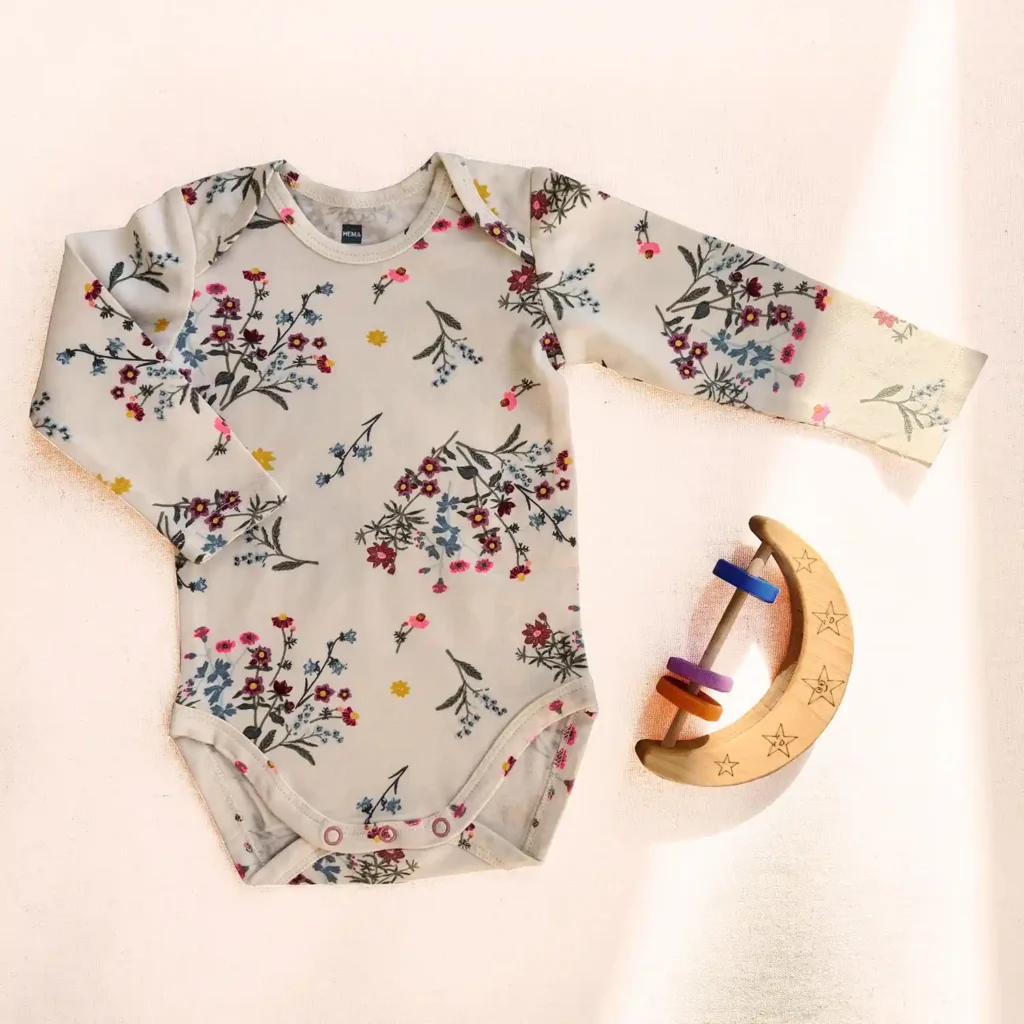 بادی آستین بلند طرح گل های رنگی رنگ سفید برند HEMA