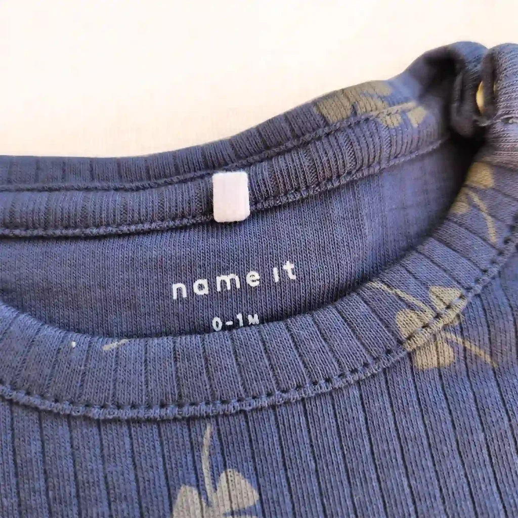 بادی آستین بلند کبریتی برگ شبدر رنگ آبی تیره برند name it