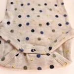 بادی آستین بلند کبریتی طرح شکلک های خندان کرم برند name it