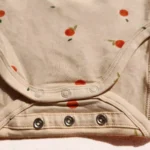 زیر دکمه آستین بلند طرح نارنگی رنگ کرم برند HEMA