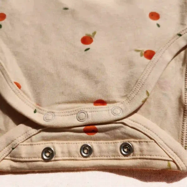 زیر دکمه آستین بلند طرح نارنگی رنگ کرم برند HEMA