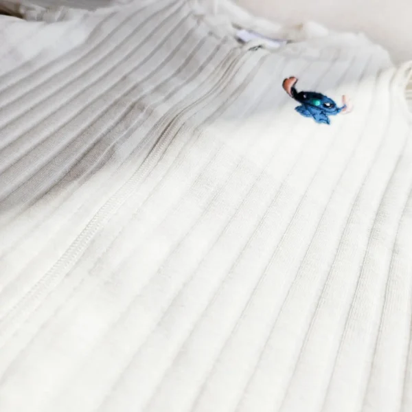 سرهمی وارداتی دو زیپ مدل کبریتی طرح استیج رنگ سفید برند H&M