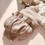 کاپشن سرهمی دخترانه وارداتی اورجینال مدل پاپیونی رنگ کرم نسکافه ای