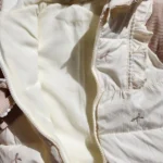 کاپشن سرهمی کلاهدار وارداتی اورجینال مدل پاپیونی رنگ کرم نسکافه ای