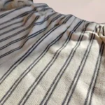 شلوار نوزادی راه راه رنگ شیری