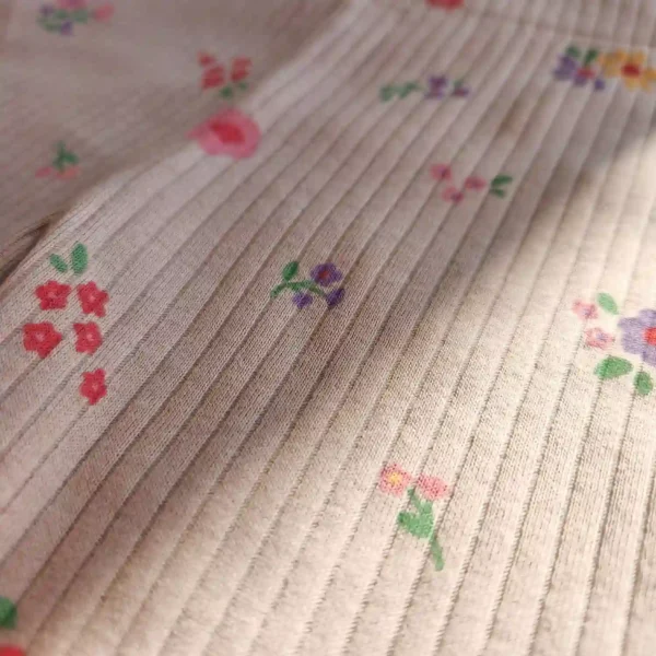 شلوار نوزادی کبریتی طرح گل رنگ کرم برند