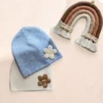 کلاه نوزادی کشبافت طرح گل مرواریدی