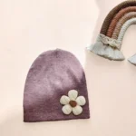 کلاه نوزادی کشبافت مدل گل دکمه ای رنگ بنفش