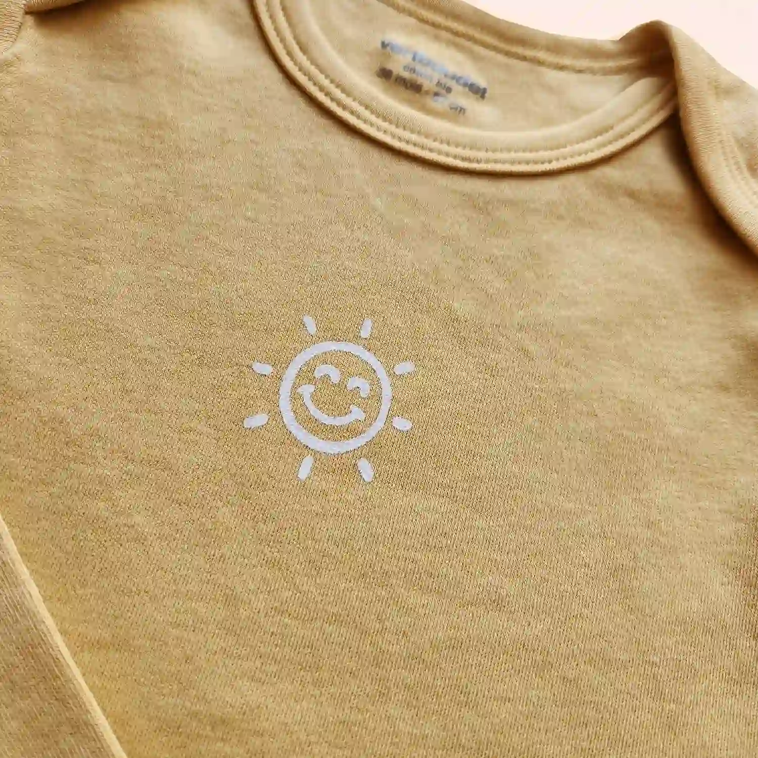 بادی آستین بلند طرح خورشید رنگ زرد برند Vertbaudet