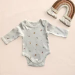 بادی آستین بلند طرح دایناسورهای کوچولو رنگ سفید برند vertbaudet