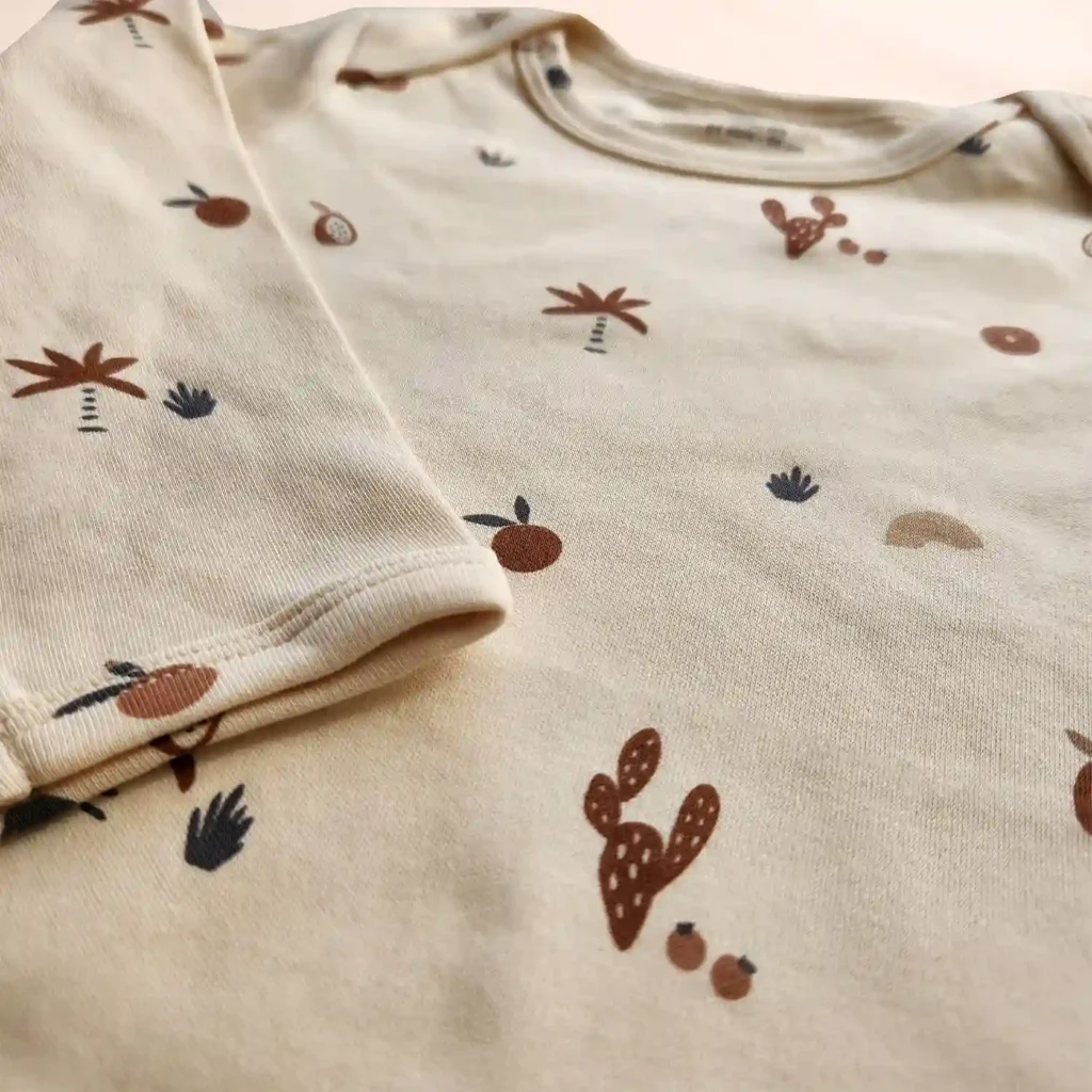 بادی آستین بلند طرح کویر کوچولو رنگ کرم