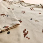 بادی آستین بلند طرح کویر کوچولو رنگ کرم