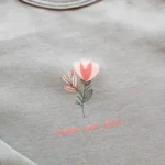 بادی آستین بلند طرح گل رنگ سبز برند ورت بایودت