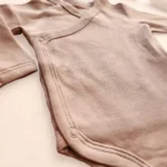 بادی آستین بلند یقه هفت ساده رنگ صورتی تیره برند vertbaudet