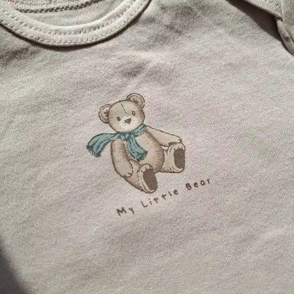 بادی آستین بلند وارداتی طرح تدی رنگ کرم برند C&A کد 10417