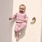 تن خور سرهمی نوزادی بافت وارداتی چین دار طرح گل رنگ صورتی برند Carters