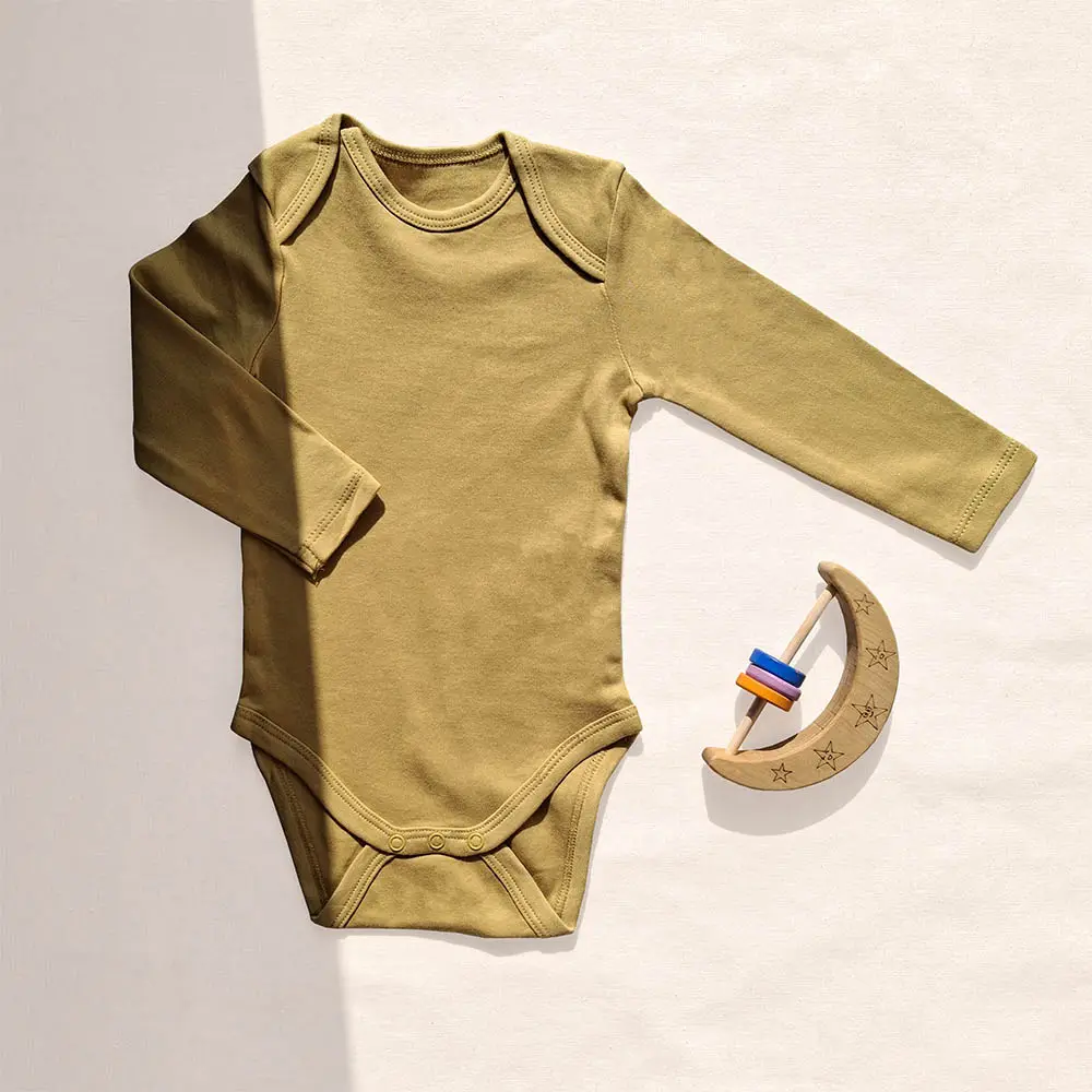 بادی آستین بلند وارداتی ساده رنگ خردلی برند C&A