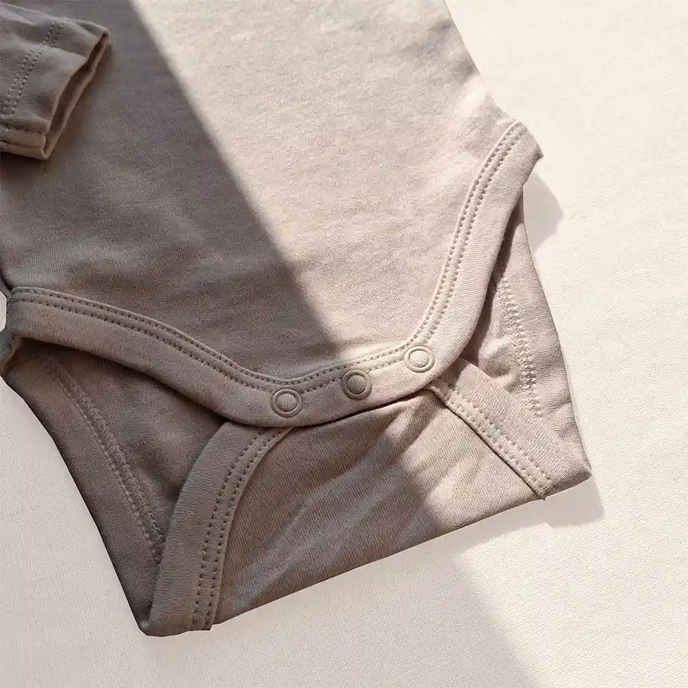 بادی آستین بلند وارداتی ساده رنگ صورتی روشن برند سی اند ای