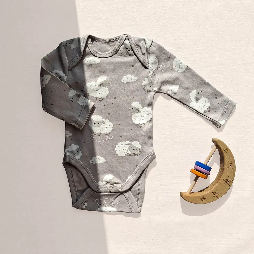 بادی آستین بلند وارداتی طرح ابر و بره رنگ کرم برند C&A