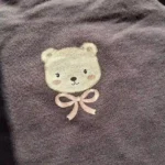 بادی آستین بلند وارداتی طرح خرس کوچولو رنگ طوسی برند سی اند ای