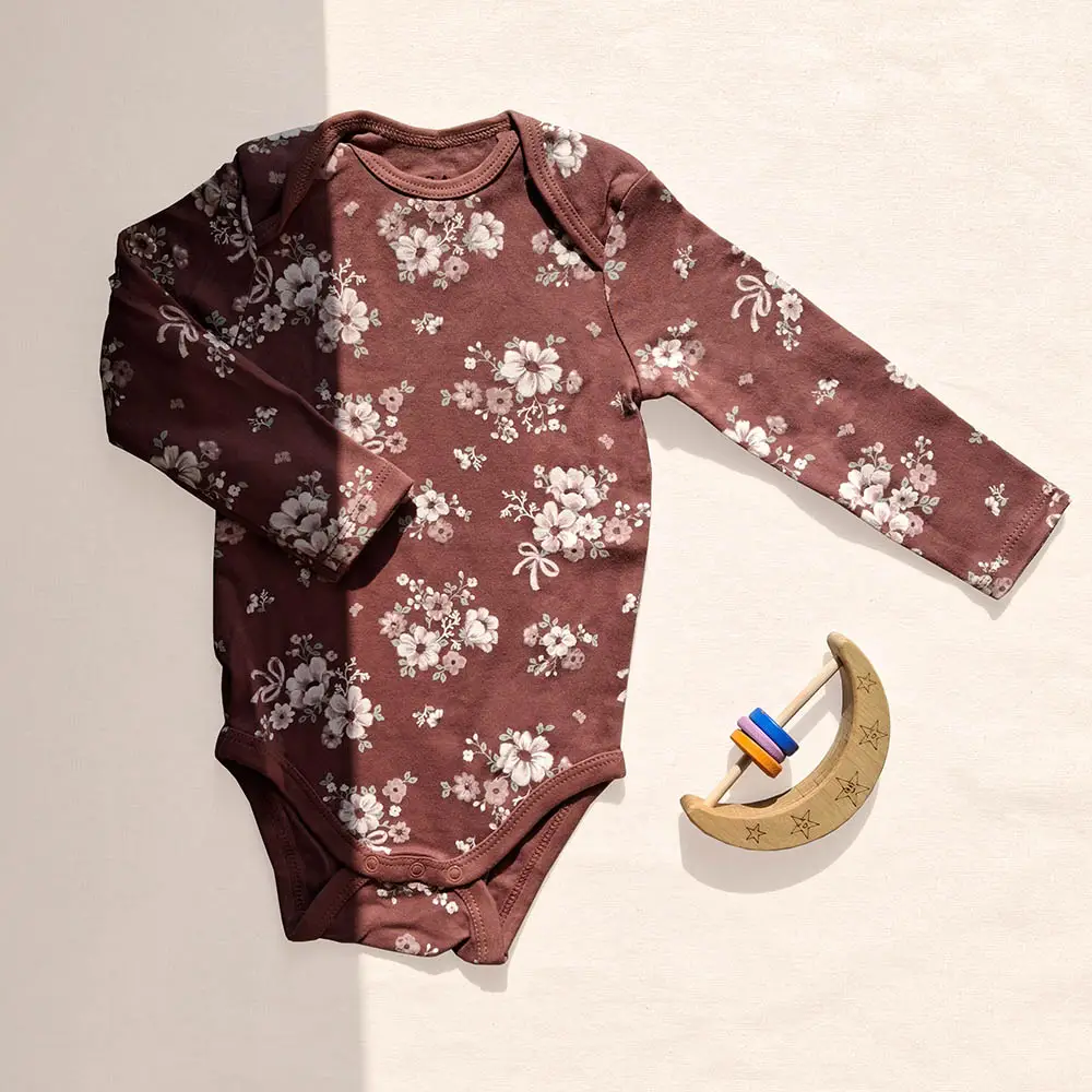 بادی آستین بلند وارداتی طرح گلدار رنگ عنابی برند C&A