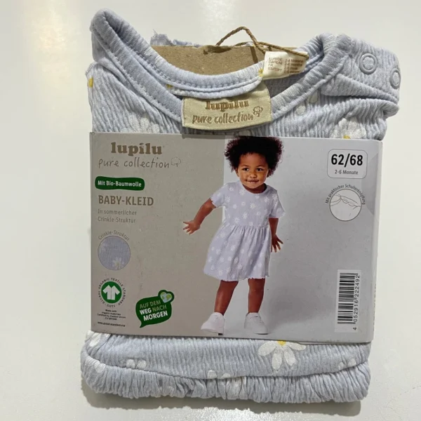 پیراهن نوزادی لوپیلو مدل موسلین طرح گل بابونه