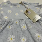 پیراهن وارداتی نوزادی لوپیلو مدل موسلین طرح گل بابونه