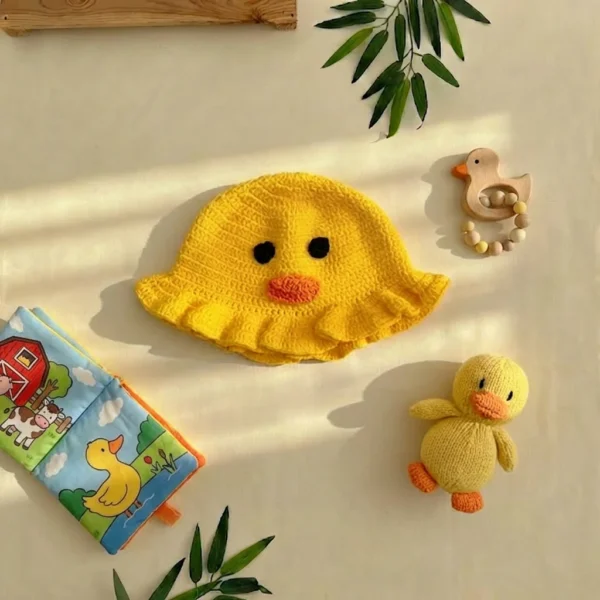 کلاه نوزادی دست بافت طرح جوجه رنگ زرد کد 10480