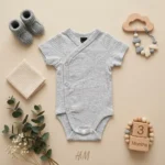 بادی آستین کوتاه وارداتی یقه هفت کبریتی ساده رنگ طوسی برند H&M