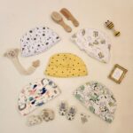 کلاه نوزادی وارداتی تم سفید زرد برند Carters