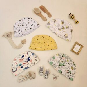 کلاه نوزادی وارداتی تم سفید زرد برند Carters