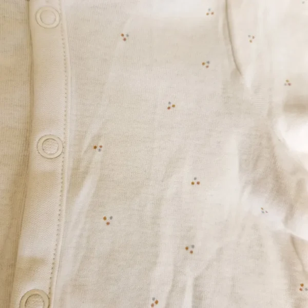 قیمت سرهمی نوزادی جوراب دار وارداتی طرح خالدار رنگ شیری برند H&M