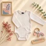 بادی آستین بلند وارداتی کبریتی ساده رنگ کرم برند H&M